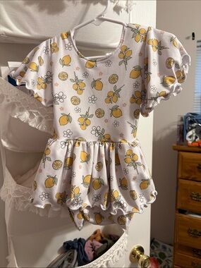 White Baby Peplum Romper with Yellow Lemon Print